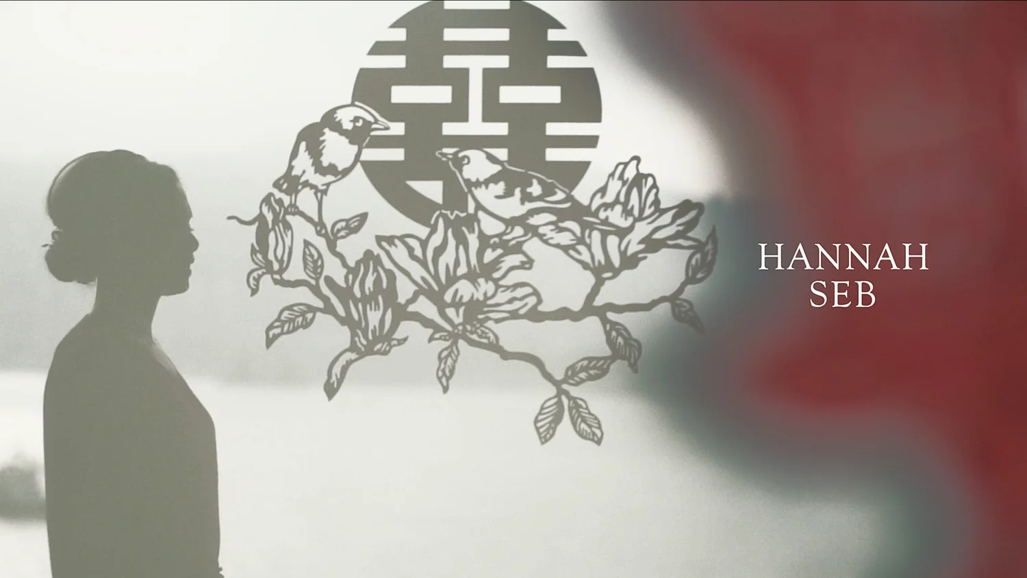 雙喜剪紙前的人像剪影